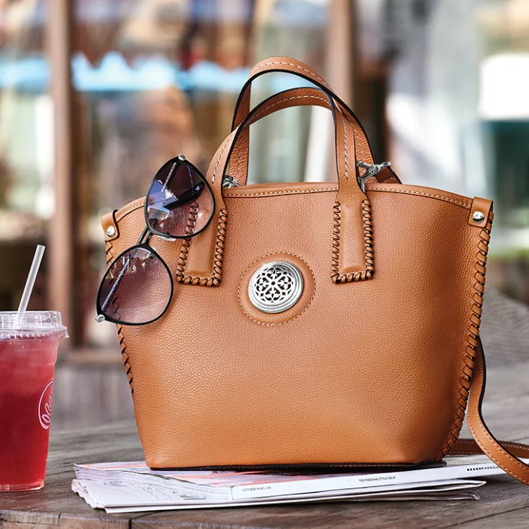 The Fashion Statement: How Designer Handbags Shape Style Trends